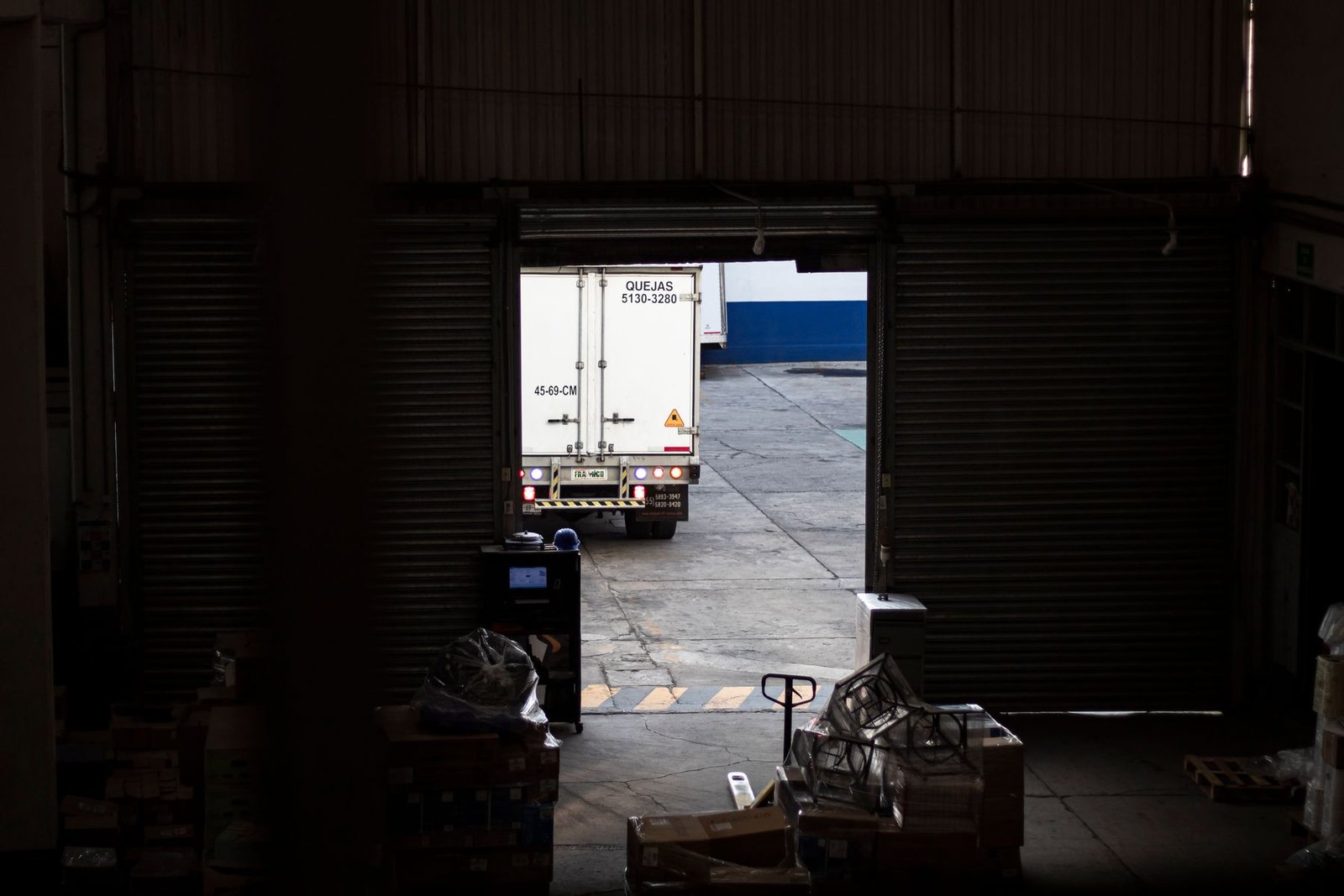Delivery truck at a warehouse loading dock