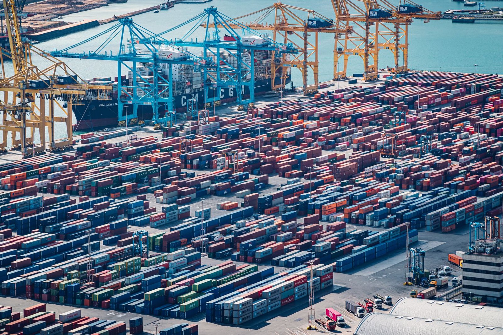 Aerial view of shipping containers at a logistics port corridor, illustrative of South Florida's perishable-freight gateway